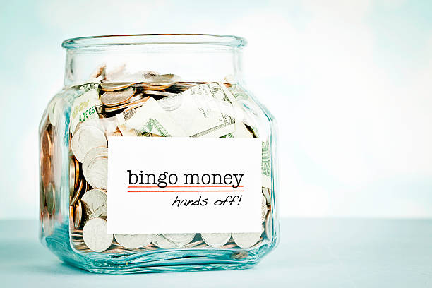 istock Savings Jar with Bingo Money 180840234