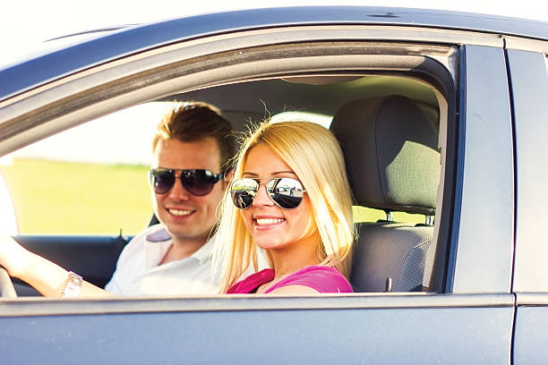 istock Young couple in car. 180840345