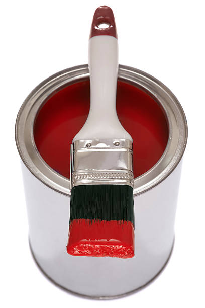 istock Paintbrush on a tin of red paint 180840769