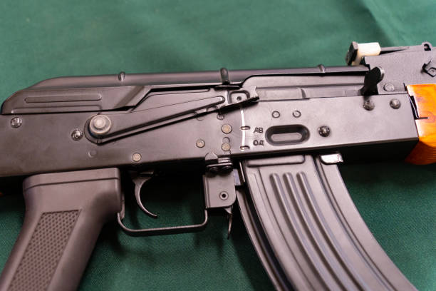 istock AK-47 Kalashnikov airsoft assault rifle with a green background 1808410569