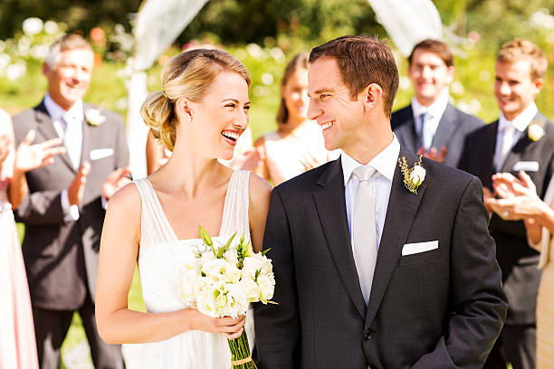 istock Newlywed Couple Looking At Each Other 180841106