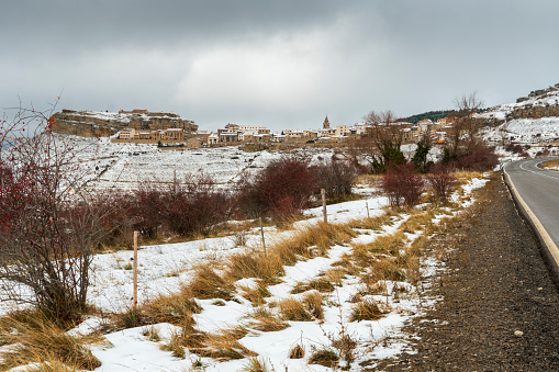 Covered winter Gudar village in Gudar mountains Teruel Aragon Spain