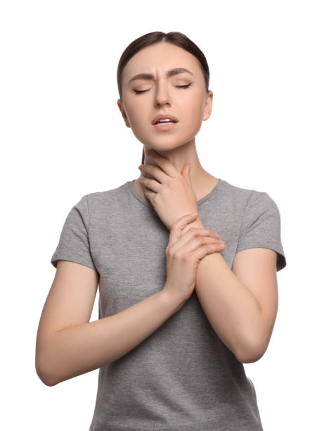 istock Young woman with sore throat on white background 1808418107
