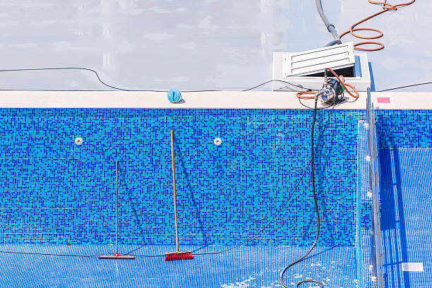 istock Swimming pool cleaning and repairs 180841882