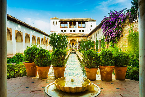 Alhambra gardens Beautiful patio in the Alhambra gardens, Granada, Andalusia, Spain. granada stock pictures, royalty-free photos & images