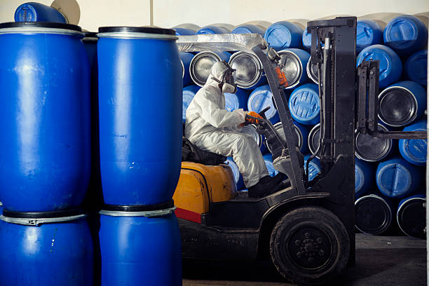 Industrial worker on forklift stock photo