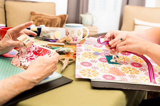 Art and Craft: Scrapbooking with friends.  Stamps spelling JOY