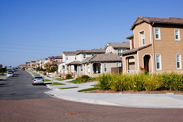 istock Neighborhood Home Exterior and Blue Sky 180842941