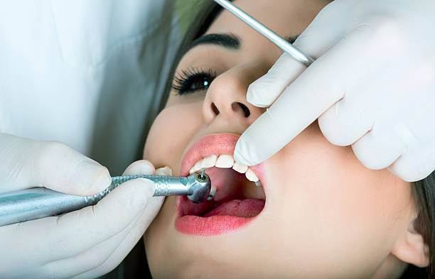 girl at the dentist stock photo