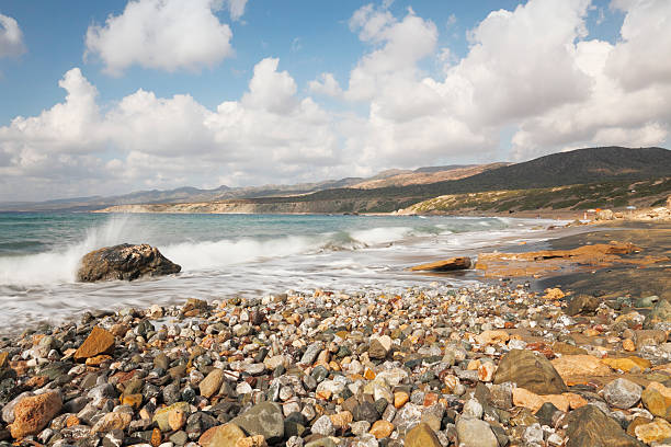 long exposure rough lonely pebble blue mediterranean Lara Beach  Cyprus