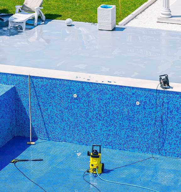 Swimming pool cleaning and repairs Swimming pool cleaning and repairs. vacation rental cleaning stock pictures, royalty-free photos & images