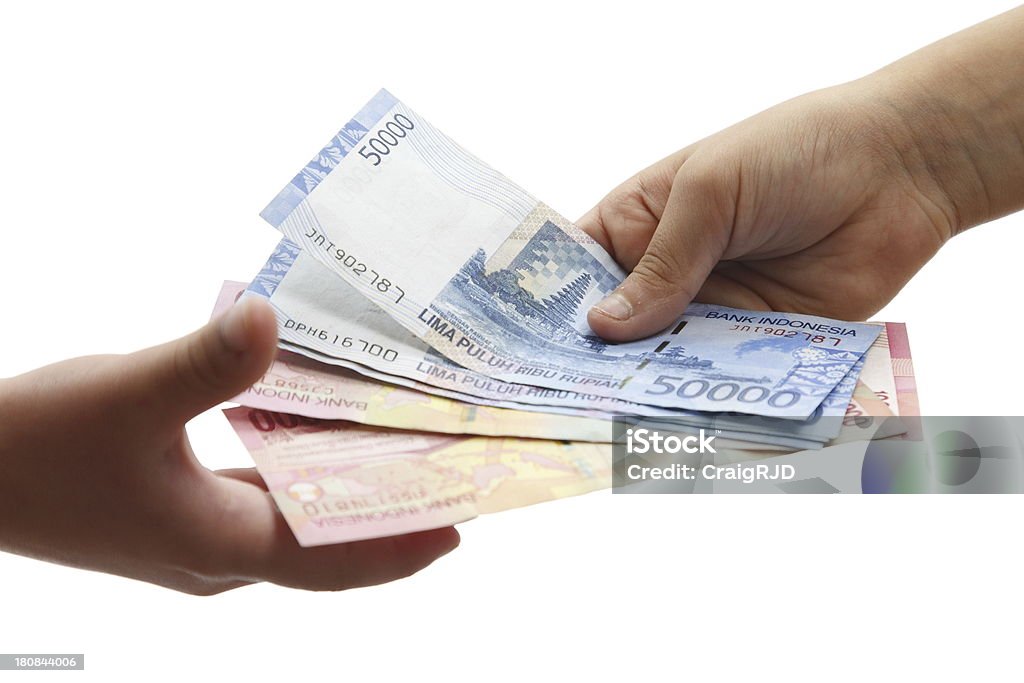 Indonesian Payment Paying in Indonesian currency Indonesian Currency Stock Photo