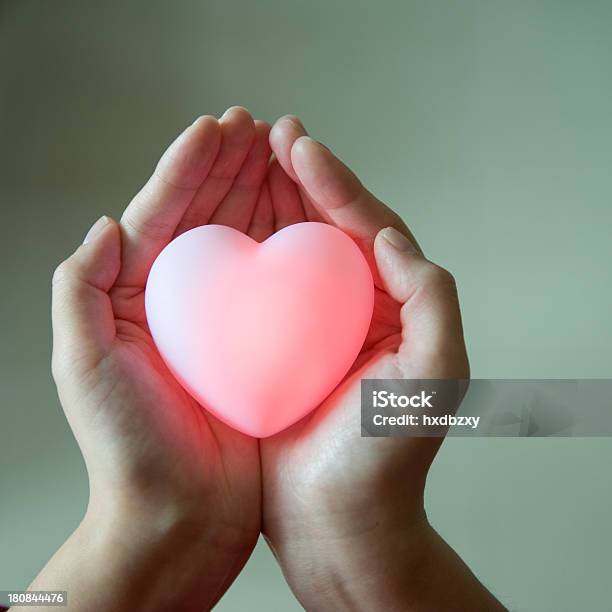 Heart In Hands Stock Photo - Download Image Now - Adult, Adults Only, Affectionate
