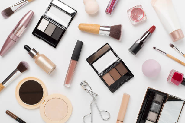 istock Flat lay with makeup products and tools on color background 1808447645