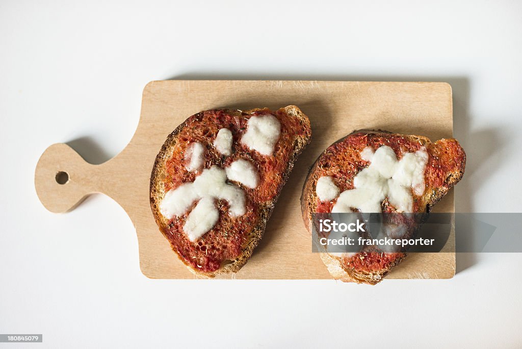 Bruschette de Pizza na mesa - Foto de stock de Alho royalty-free