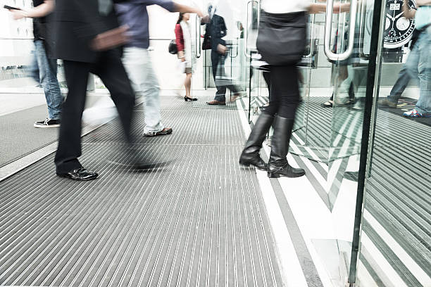 istock business people walking to office 180845358