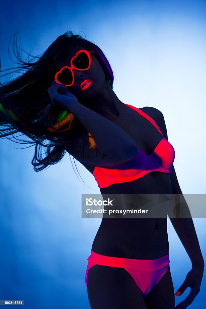 Sexy bailarina de luz negra - Foto de stock de Color neón libre de derechos