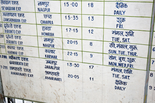 Railway timetable at Mumbai station