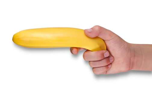 Banana Holding with Hand Gun - Clipping Path