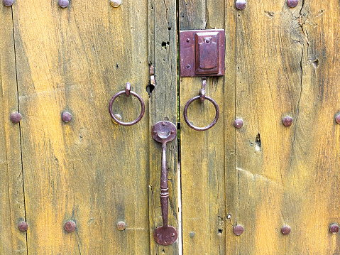 Santa Fe Style: Antique Hardware on Rustic Greenish Door