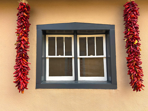 Santa Fe, NM: Two Chili Pepper Ristras Decorate Window