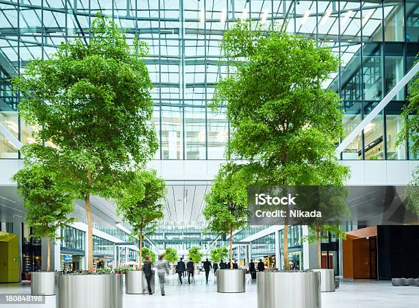 Business People In A Financial District Stock Photo - Download Image Now - Indoors, Public Park, Activity