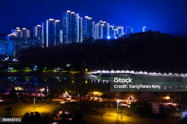 Chuncheon City Night Skyline And Buildings On The Pine Forest Hill In South Korea Illuminated Gongjicheon Amusement Park Along The Soyanggang River And Samaksan Mountains View In Gangwondo Stock Photo - Download Image Now