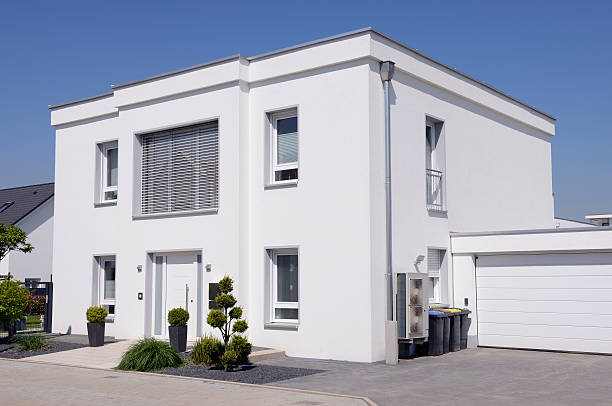 istock Contemporary white house with garage 180849148