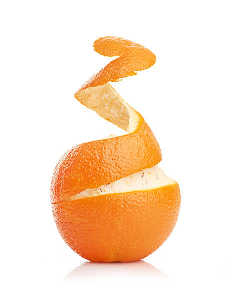 istock orange with peeled spiral skin 180849210