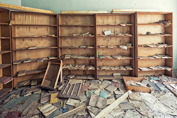 Abandoned Library "Pripyat ghost town, Chernobyl, Ukraine.Abandoned in 1986 after a nuclear disaster in Chernobyl power plant. There are still high radiation levels at the region. Most of the buildings are plundered." school exclusion stock pictures, royalty-free photos & images