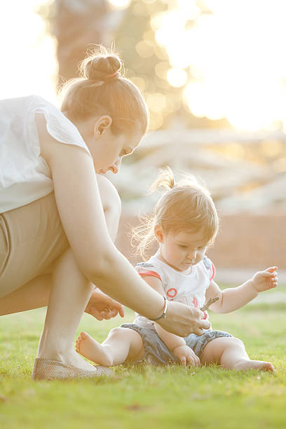 istock Mother and daughter playing 180850233