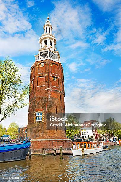 Foto de Canais De Amsterdã Munttoren Em Centrum e mais fotos de stock de Amsterdã - Amsterdã, Arquitetura, Barco de passageiros