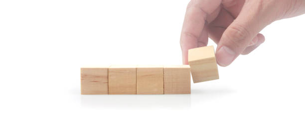istock Wooden cubes in hand with copy space for input wording 1808515870