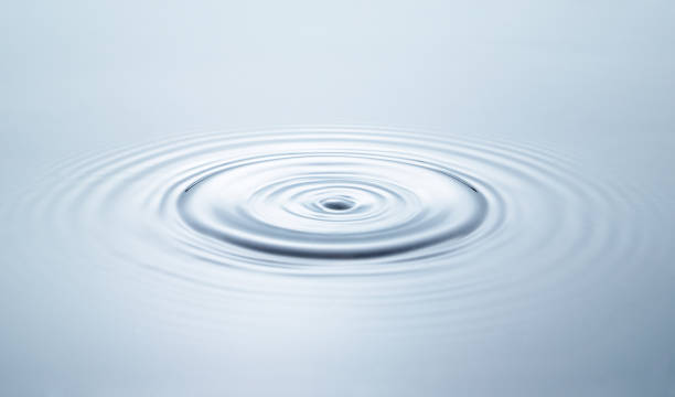 istock Blue water circles surface with rings and ripples from drop 1808515874