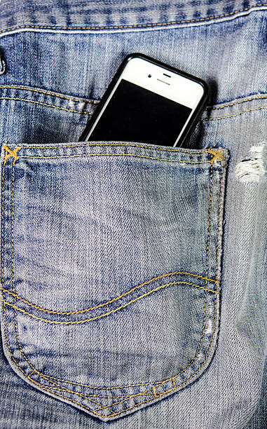 istock jeans pocket smart phone. 180853424