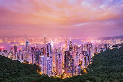 View of the downtown of Hong Kong from Victoria Peak at sunset.