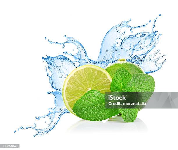 Foto de Limão E Hortelã Em Água Splash e mais fotos de stock de Bebida alcoólica - Bebida alcoólica, Comida, Coquetel