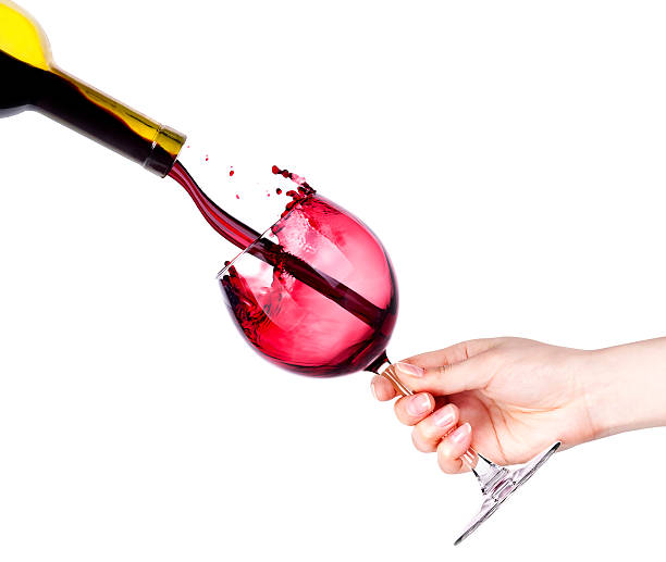 Splash red wine against a white background