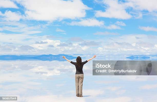 Woman With Hands Raised Stock Photo - Download Image Now - Rear View, Wide, Arms Raised