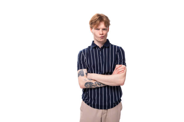 istock smart handsome young blond man in a tank top on a white background 1808602643
