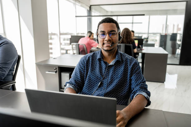 istock Portrait of a young apprentice working in a telemarketing office 1808603192