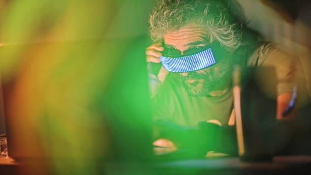 istock Pro gamer playing online video game with VR goggles. 1808604348