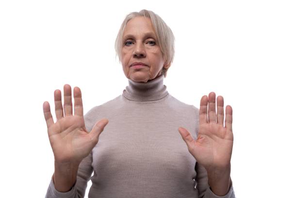 istock Granny with gray hair expresses her disagreement 1808608929