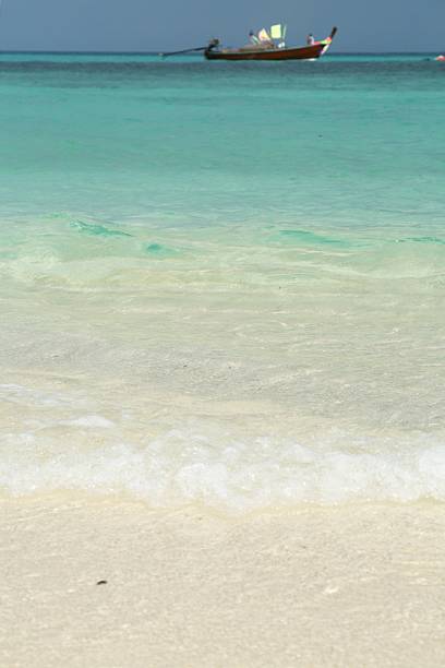 istock White beach and turquoise andaman sea 180861820