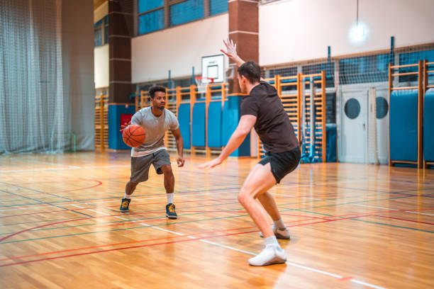 istock Diverse Friends Playing One On One Basketball 1808634740