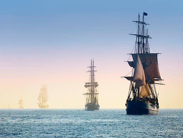 Tall Ships in the Mists of Morning Fog Tall Ships in the Mists of Morning Fog  sailing ship stock pictures, royalty-free photos & images