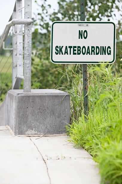 istock No Skateboarding Sign near Curb and Railing 180865692