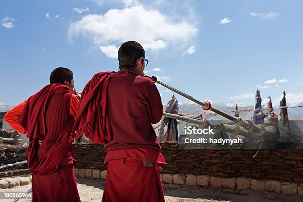 Tibetan Monks Playing Buddhist Horns Stock Photo - Download Image Now - Monk - Religious Occupation, Buddhism, Child