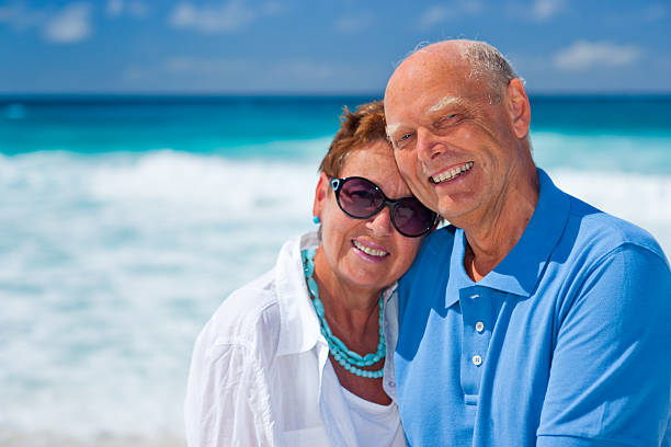 istock happy smiling best ager couple on summer vacation 180866576