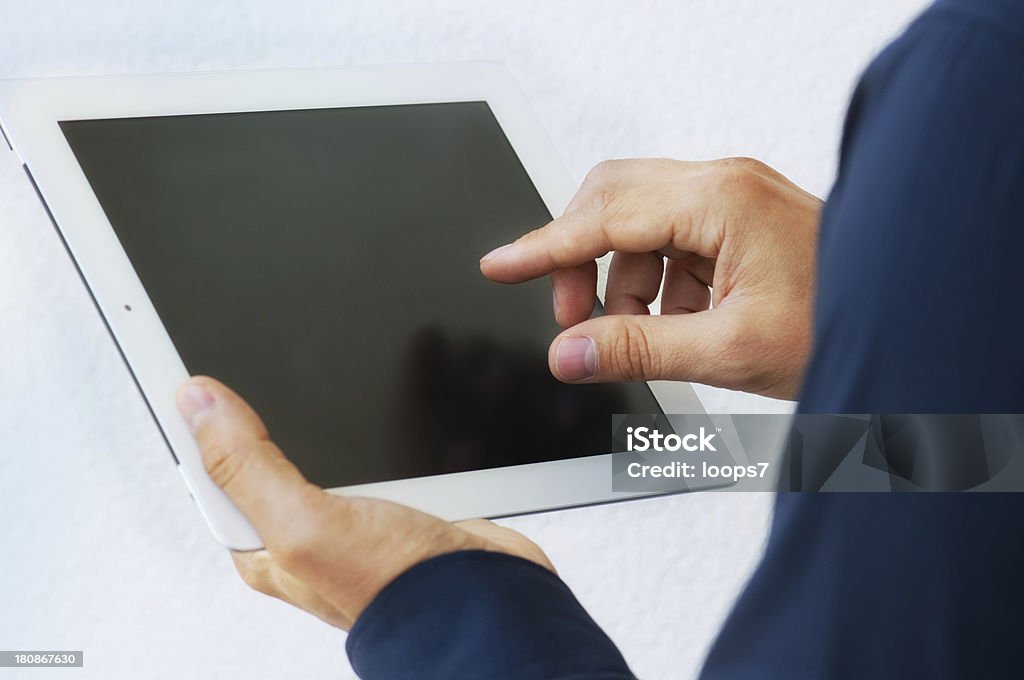 Un homme et une tablette - Photo de Adulte libre de droits